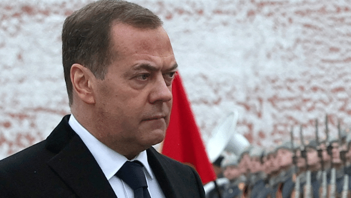 Russia's Deputy head of the Security Council Dmitry Medvedev takes part in a wreath laying ceremony marking Defender of the Fatherland Day at the Tomb of the Unknown Soldier by the Kremlin Wall in Moscow, Russia, 23 February 2024 | Yekaterina Shtukina | Reuters