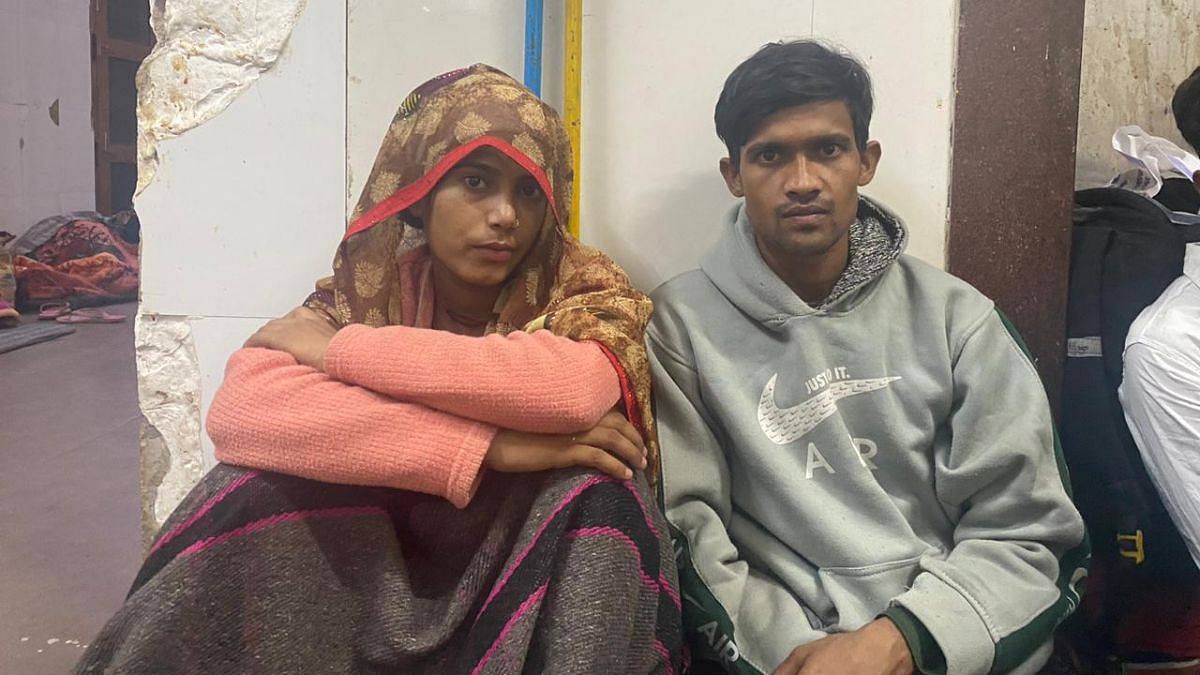 Neelu and Kuldeep, parents of a baby boy admitted to the paediatric ward of Jhansi medical college after the fire | Shikha Salaria, ThePrint