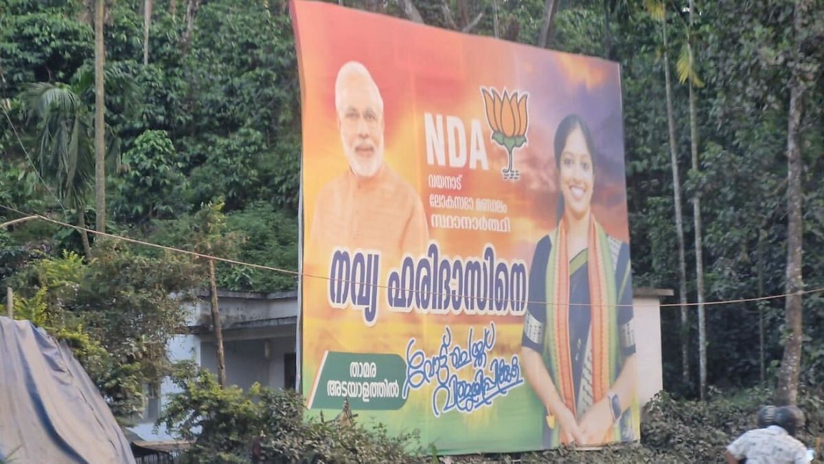 A poster of the BJP candidate Navya Haridas with PM Modi, in Wayanad. | Sharan Poovanna | ThePrint