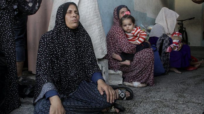 Palestinians react after a school sheltering displaced people was hit by an Israeli strike, at Beach camp in Gaza City 7 November 2024 | Mahmoud Issa | Reuters