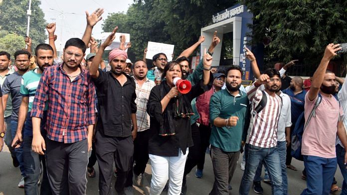 UPPSC aspirants continue with their protest in Prayagraj on Thursday. | ANI