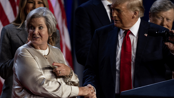 US President-elect Donald Trump shakes hands with his senior advisor Susie Wiles in Palm Beach County Convention Center in Florida | Reuters