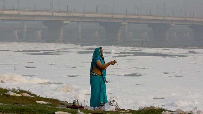 A Chhath devotee offers prayers | Suraj Singh Bisht | ThePrint