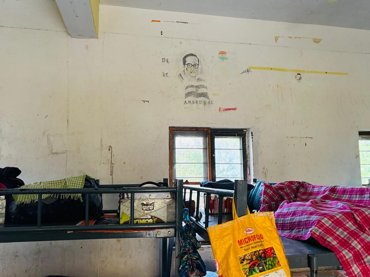 A portrait of Ambedkar in a hostel dormitory | Vandana Menon | ThePrint