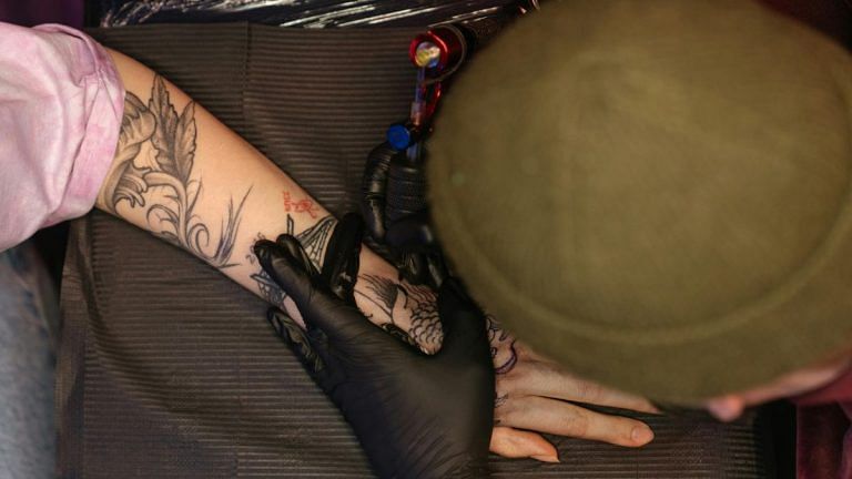 Before you pick the tattoo, pick the studio