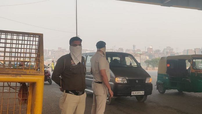 Delhi’s toxic smog is choking the cops on the streets. N95 masks, handkerchiefs ‘not enough’