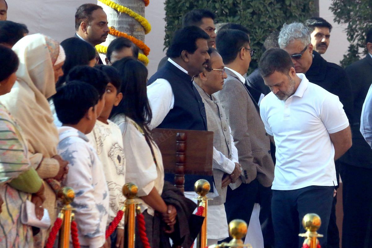 Leader of Opposition Rahul Gandhi stands near the family members of maytrs of the Parliament attack on 13 December 2001| Praveen Jain | ThePrint 