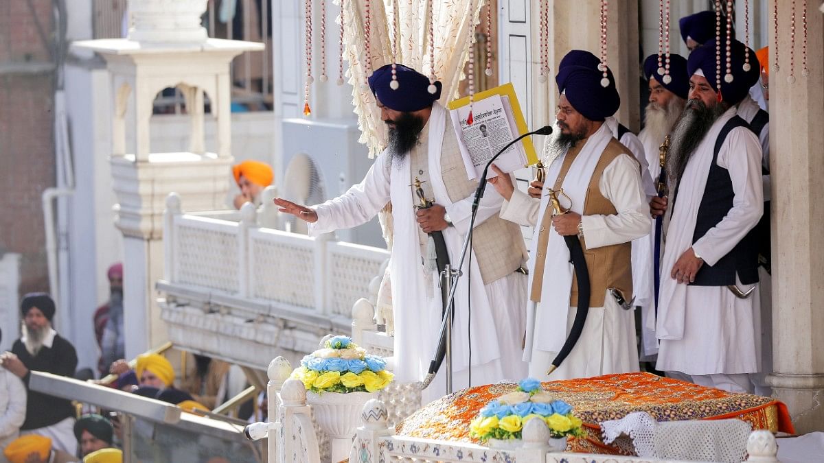 Akal Takht jathedar and four Singh Sahibaan reading out punishments at Golden Temple in Amritsar, Monday | ANI