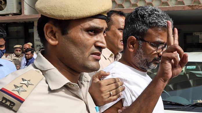 Professor Ratan Lal being produced before court after his arrest by the Delhi Police in May 2022 | Photo: ANI
