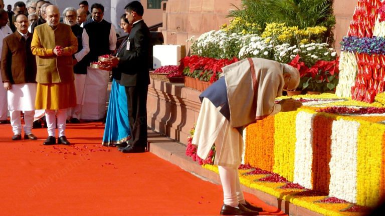 Bowed heads & floral tributes. Modi, Shah, Rahul honour those killed in 2001 Parliament attack