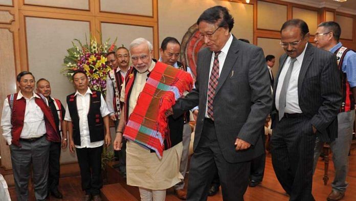 PM Narendra Modi with NSCN-IM gen secy Thuingaleng Muivah at signing of Naga peace accord in 2015 | Facebook @PMO