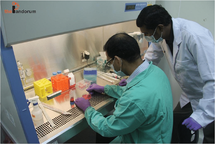 Scientists from Pandorum Technologies in their labs