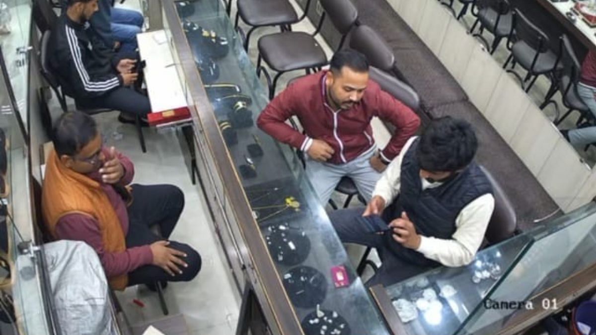 Lavi (in red jacket) and Arjun Karnwal at a jewellery shop | By special arrangement | ThePrint