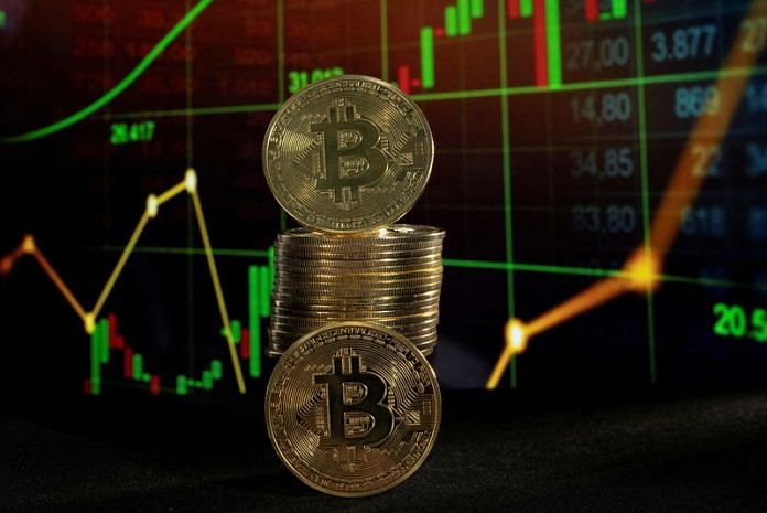 Wall Street stocks, bitcoin take breath from record highs ahead of US jobs data