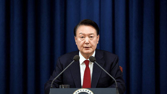 South Korean President Yoon Suk Yeol delivers a speech to declare martial law in Seoul, South Korea, on 3 December 2024. | The Presidential Office| Handout via Reuters