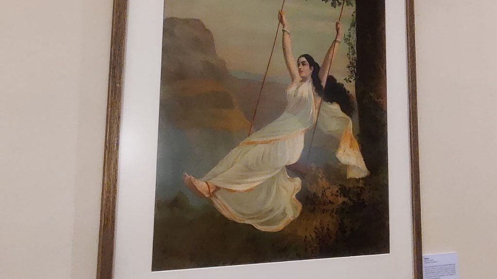 This Oleograph of Raja Ravi Varma depicts Mohini on a swing, innocently enjoying nature’s beauty while unknowingly being watched by Bhasmasura, hidden in the woods. | Photo: Sakshi Mehra | ThePrint