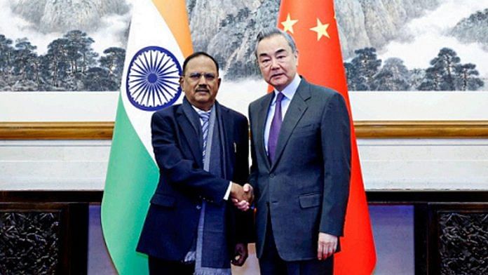 NSA Ajit Doval with Director of the Central Foreign Affairs Office Wang Yi at the 23rd meeting of the Special Representatives on the China-India Boundary Question, in Beijing Wednesday. | ANI