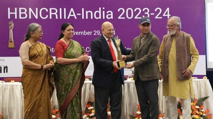 Suneel Singh receiving the HBNCRII award for bringing a 'walnut revolution' to Kishtwar (L-R: Swati Basu, Renu Swaroop, RS Paroda, Suneel Singh, and Anil Gupta)