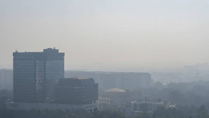 A layer of dense fog engulfs the buildings, in New Delhi, Friday, 13 December 2024. | Arun Sharma | PTI