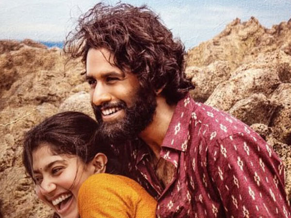 Thandel Team drops new poster on Sankranti featuring Naga Chaitanya and Sai Pallavi Thandel Team drops new poster on Sankranti featuring Naga Chaitanya and Sai Pallavi