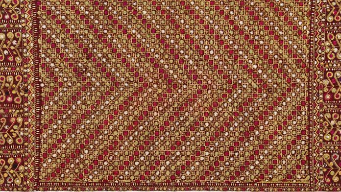 Phulkari with curved-tree motif borders, Punjab, India, First half of the 20th century, Handspun cotton plain weave (khaddar) with silk embroidery in darning, chain, running, stem, split, and cretan stitches. Image courtesy of Philadelphia Museum of Art
