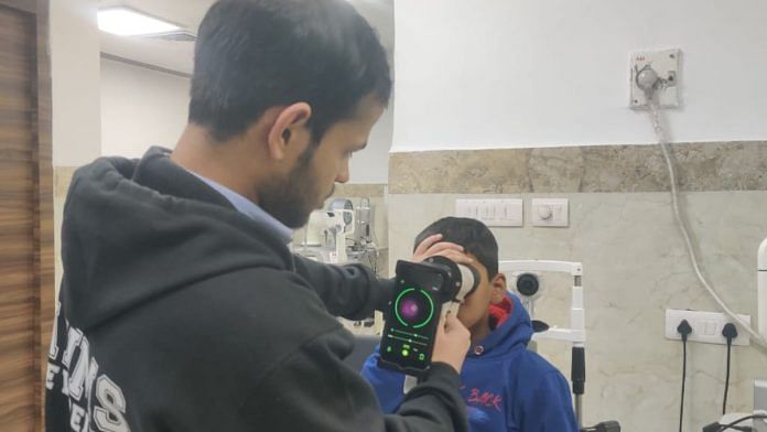 A junior doctor at AIIMS Delhi using an AI app to assess diabetic retinopathy | Mrinalini Dhyani | ThePrint