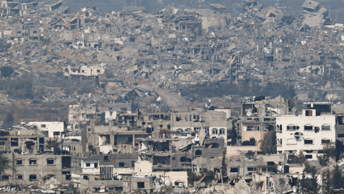 A view of damaged buildings in the northern Gaza Strip, amid the ongoing conflict in Gaza between Israel and Hamas, as seen from the Israel side of the border, near Sderot in southern Israel on 15 January 2025. | Amir Cohen | Reuters