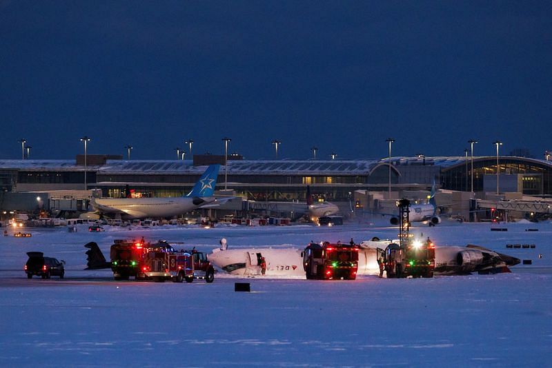 Delta plane flips upside down on landing at Toronto airport, injuring