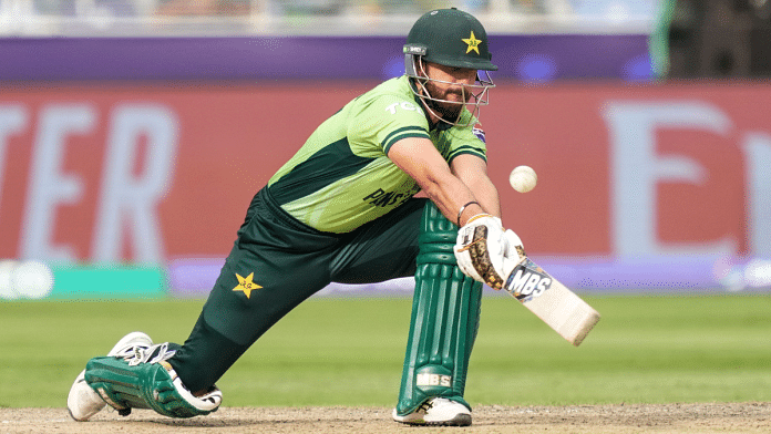 Pakistan's Salman Agha plays a shot during a One Day International (ODI) cricket match of the ICC Champions Trophy between India and Pakistan, at Dubai International Cricket Stadium, in Dubai, UAE, Sunday, 23 February 2025. | Kamal Kishore | PTI