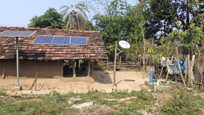Solar panels on the roof of a hut in Puvarti | Mayank Kumar | ThePrint
