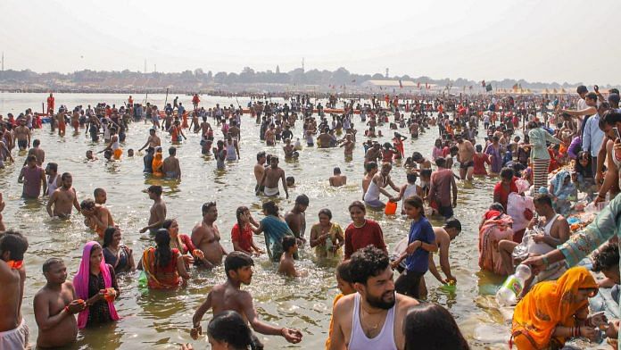 Representational image of devotees taking a dip at Triveni Sangam during the ongoing Maha Kumbh Mela 2025, in Prayagraj | ANI