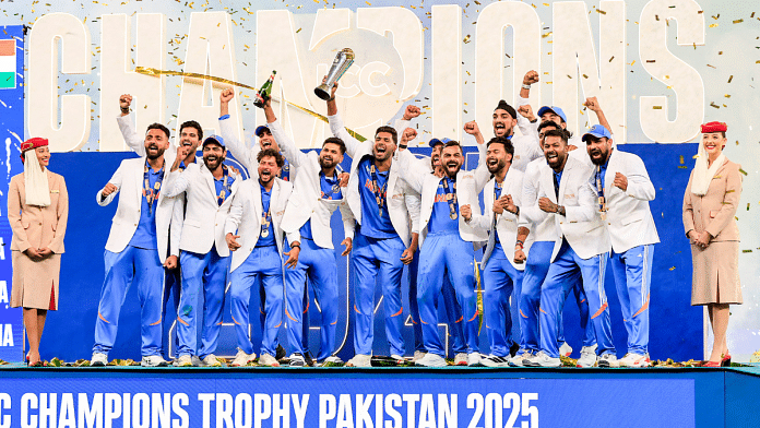 Indian players celebrate with the trophy after winning the ICC Champions Trophy 2025 final match against New Zealand, at Dubai International Cricket Stadium in Dubai. | ANI