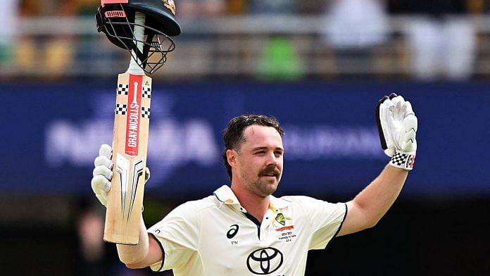 Australia’s Travis Head celebrates his century during Day 2 of the third Border-Gavaskar Trophy test match against India, at Gabba Stadium in Brisbane last December | Photo: ANI