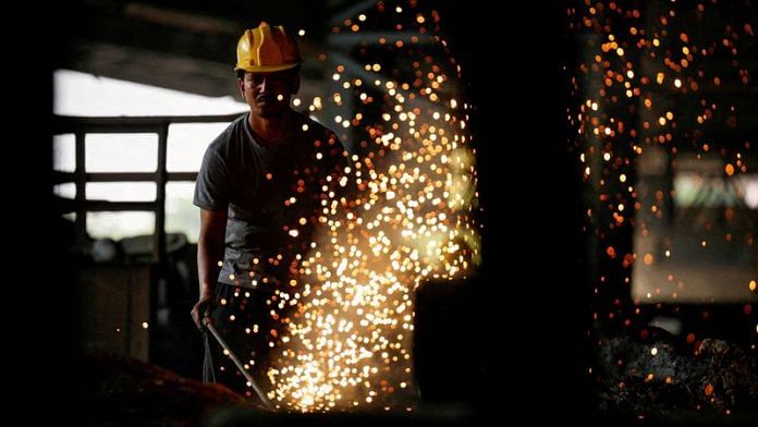 An employee works at a steel processing production line of a factory in Mandi Gobindgarh in the northern state of Punjab, India, on 19 October 2024. | File Photo | Priyanshu Singh | Reuters