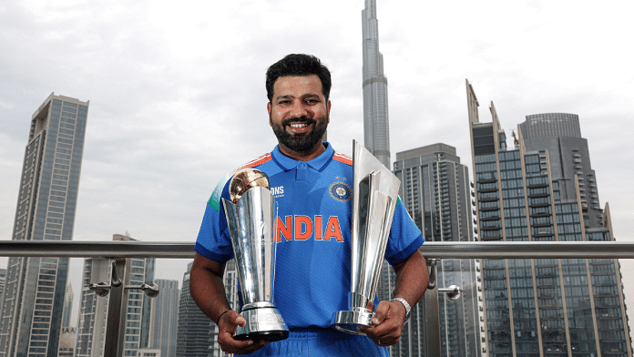 India's captain Rohit Sharma poses for a picture with the ICC Champions Trophy 2025 and T20 World Cup 2024 trophy, in Dubai | ANI
