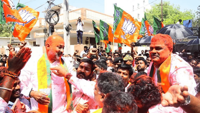 BJP senior leader Bandi Sanjay Kumar (left) celebrates with one of the two MLC winners, Malka Komaraiah, at a victory rally | X/@bandisanjay_bjp