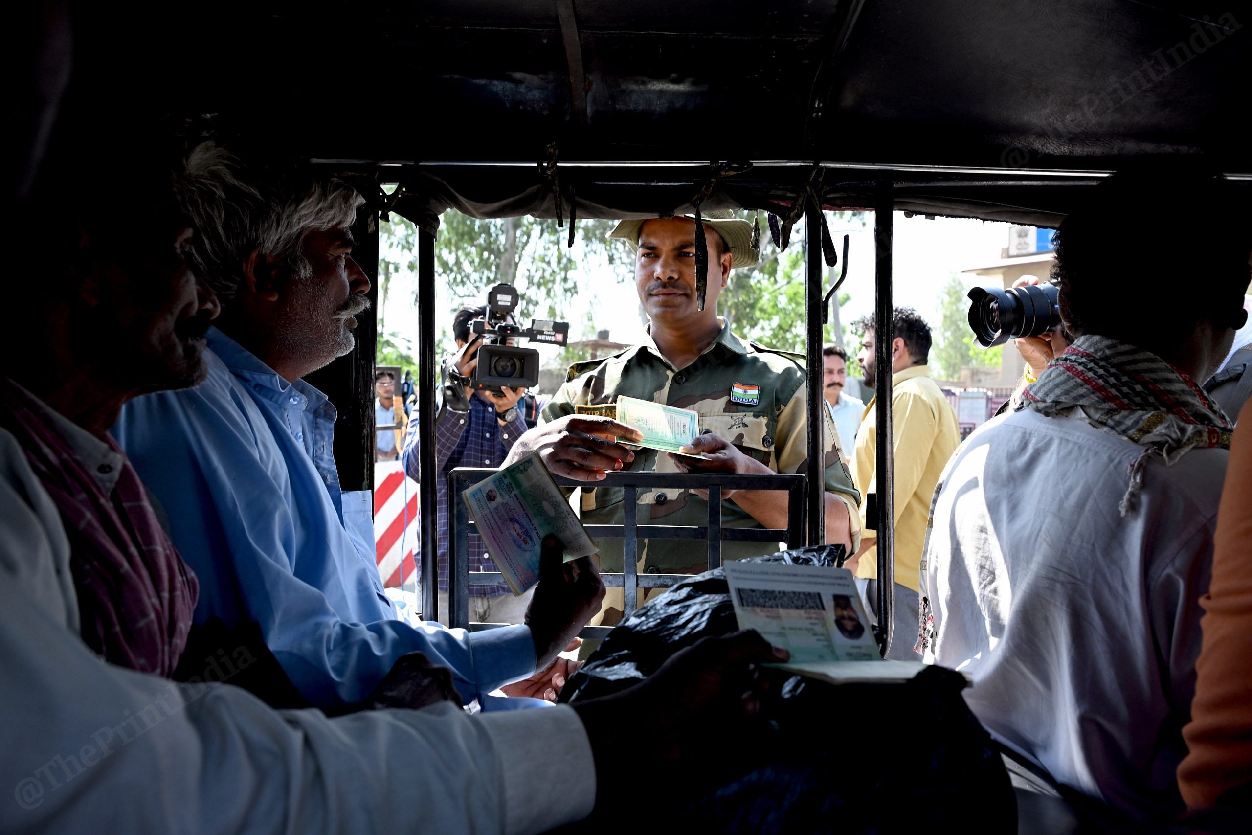 BSF personnel checking the passports of Pakistani citizens | Photo: Suraj Singh Bisht, ThePrint