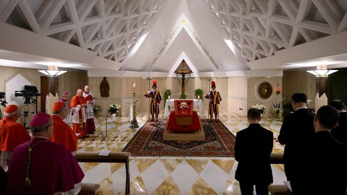 The body of Pope Francis is placed in an open casket during the rite of the declaration of death in Santa Marta residence at the Vatican, on 21 April 2025. | Vatican Media | ­Handout via Reuters