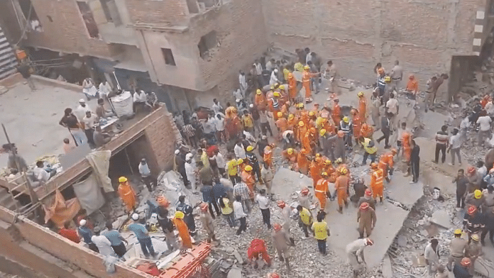 Screengrab from visuals of ongoing rescue operation at building collapse site in Mustafabad | X/@ANI