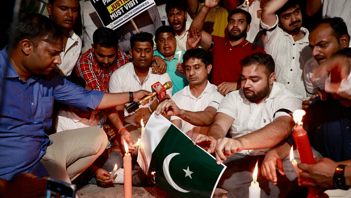 Members of Youth Congress stage candlelight protest, burn Pakistan flag against Pahalgam terror attack, Delhi | X/@pradeepdpyc