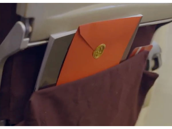 Red Envelope Mystery Continues: Passenger Discovers One in Seat Pocket