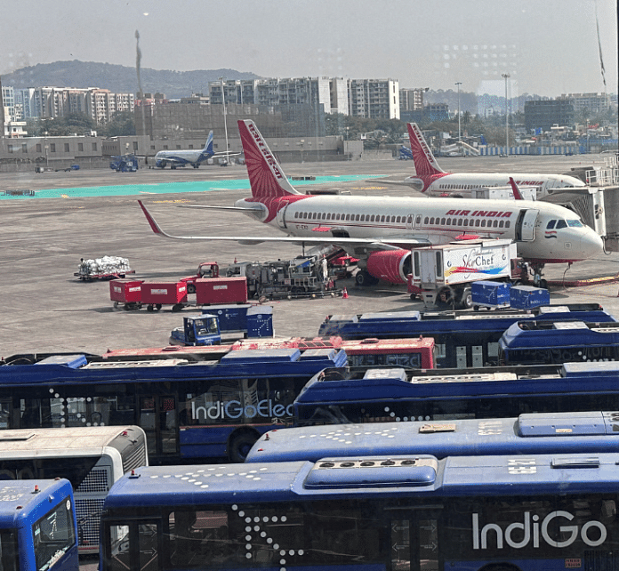 A boy looks at aircraft parked at the Chhatrapati Shivaji Maharaj International Airport in Mumbai, India, February 1, 2024 | File photo | Reuters