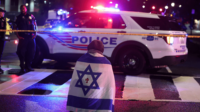 Emergency personnel work at the site where, according to the U.S. Homeland Security Secretary, two Israeli embassy staff were shot dead near the Capital Jewish Museum in Washington, D.C., U.S. May 21, 2025 | Reuters