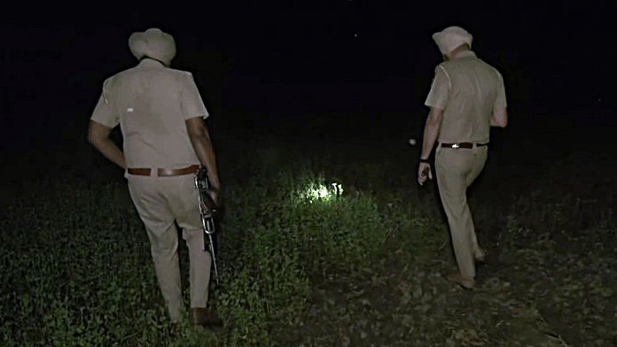 Policemen search for a Pakistani drone that was neutralised in Amritsar on Friday | ANI