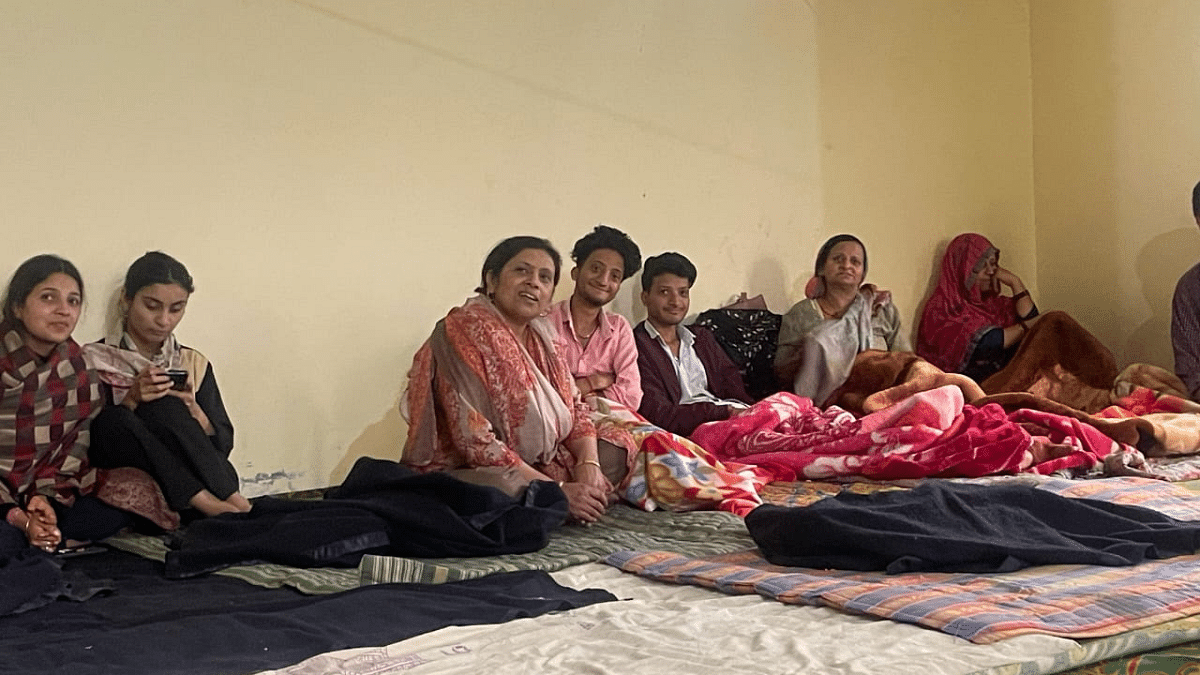 Some of the rescued border people sitting inside the homes of Sikhs in Baramulla | By Special Arrangement