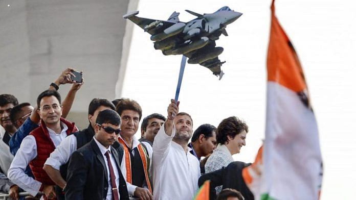 File photo | Congress president Rahul Gandhi holds a model of Rafale aircraft | PTI