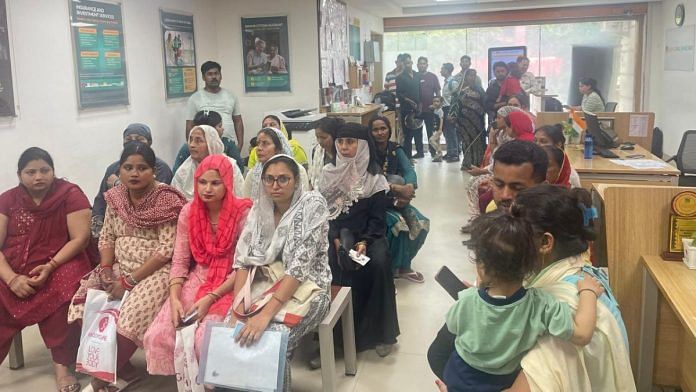 Women at Ujjivan Small Finance Bank branch in Delhi, part of voice-based banking push for low-literate users
