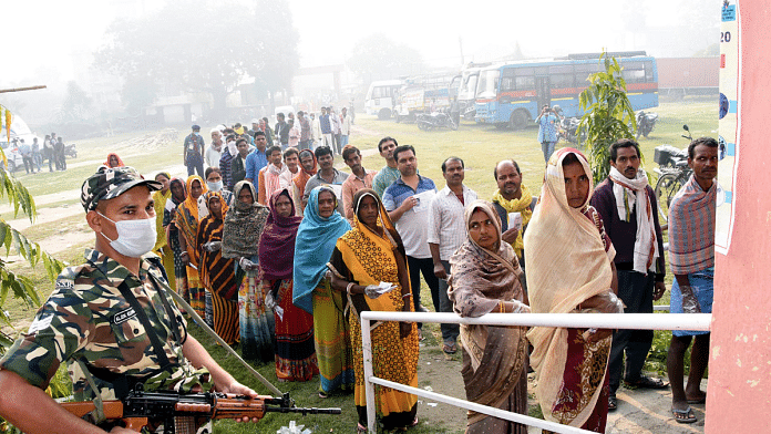 Voters stand in a queue outside a polling station in BIhar's Vaishali during previous assembly polls. | Representational image | ANI