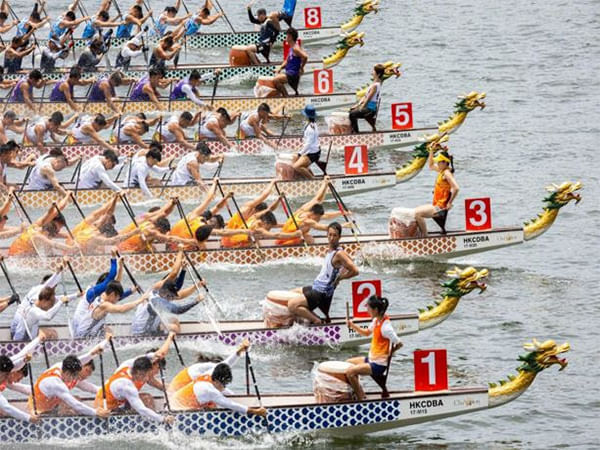 Paddles Up: Race into Hong Kong's Dragon Boat Festival Join the Weeklong Festivities Against Victoria Harbour's Iconic Skyline