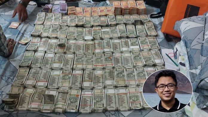 Money recovered during search at IAS officer Dhiman Chakma's (bottom right) government residence. | X
